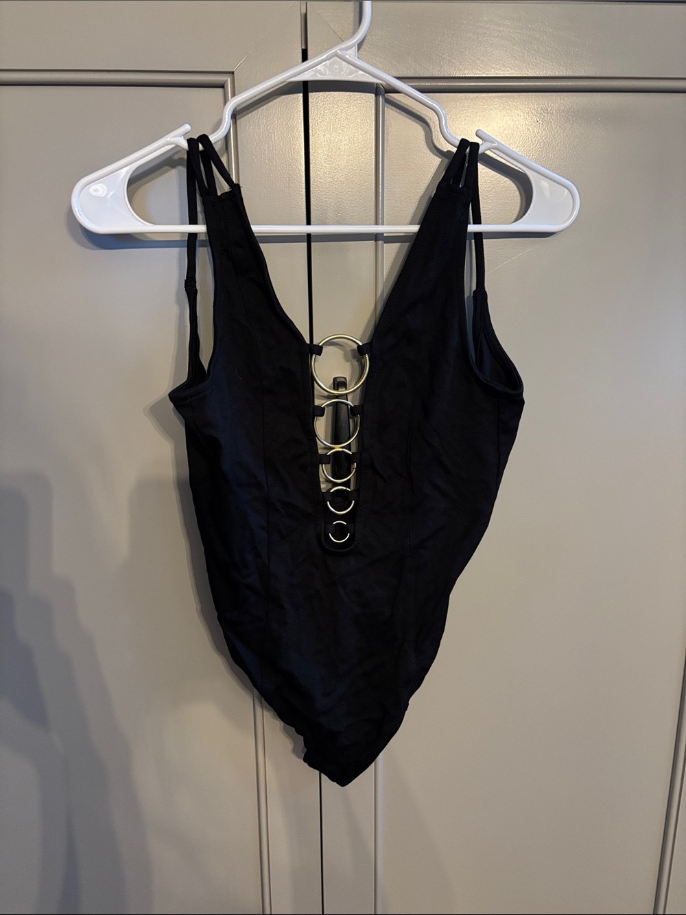 Nasty Gal XS Black bodysuit with gold rings